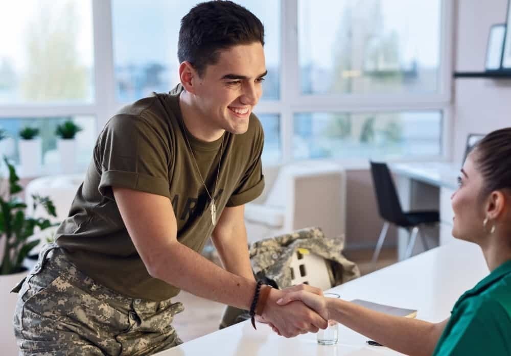 Veteran shaking hands with recruiter